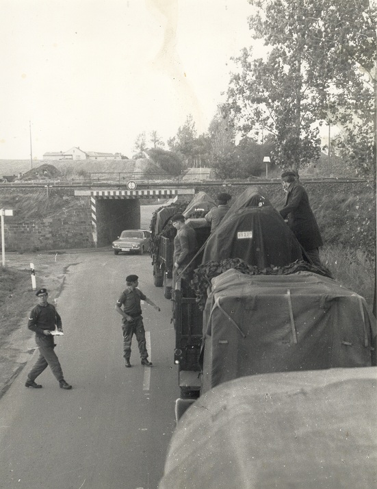 convoy at low bridge